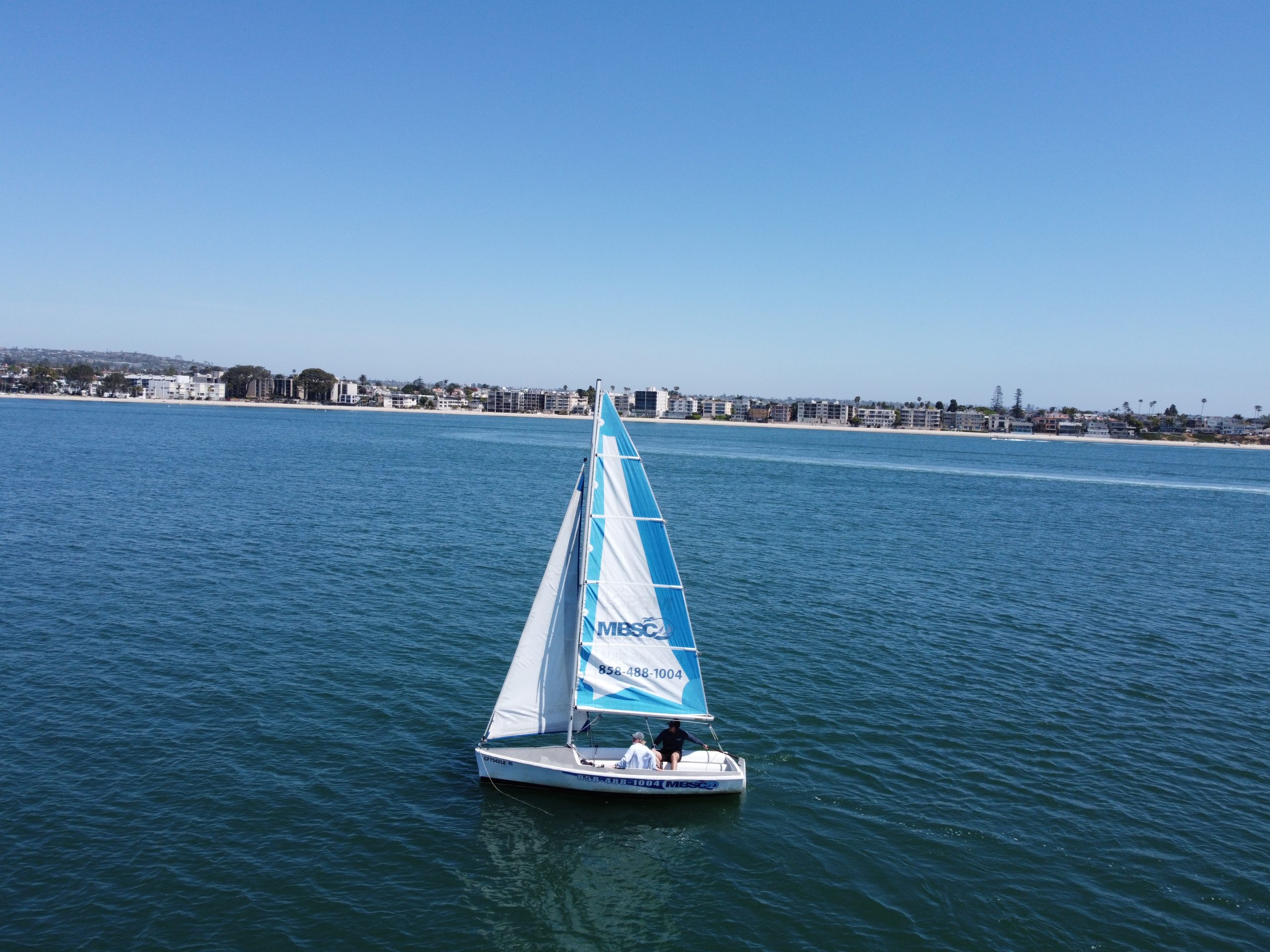 Catalina 14.2 sailboat underway on Mission Bay in San Diego