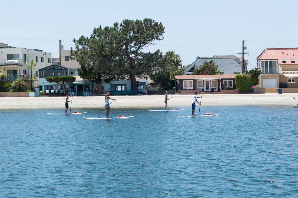 Stand-up paddleboard rentals on the bay near Santa Clara Point in San Diego