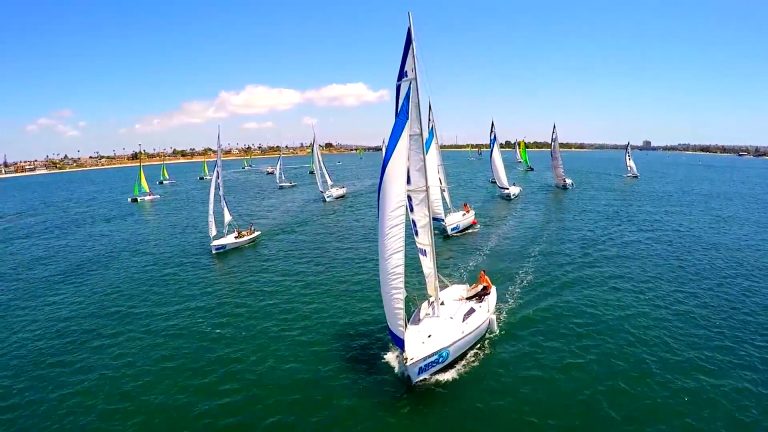 Sailboats cruising together across Mission Bay