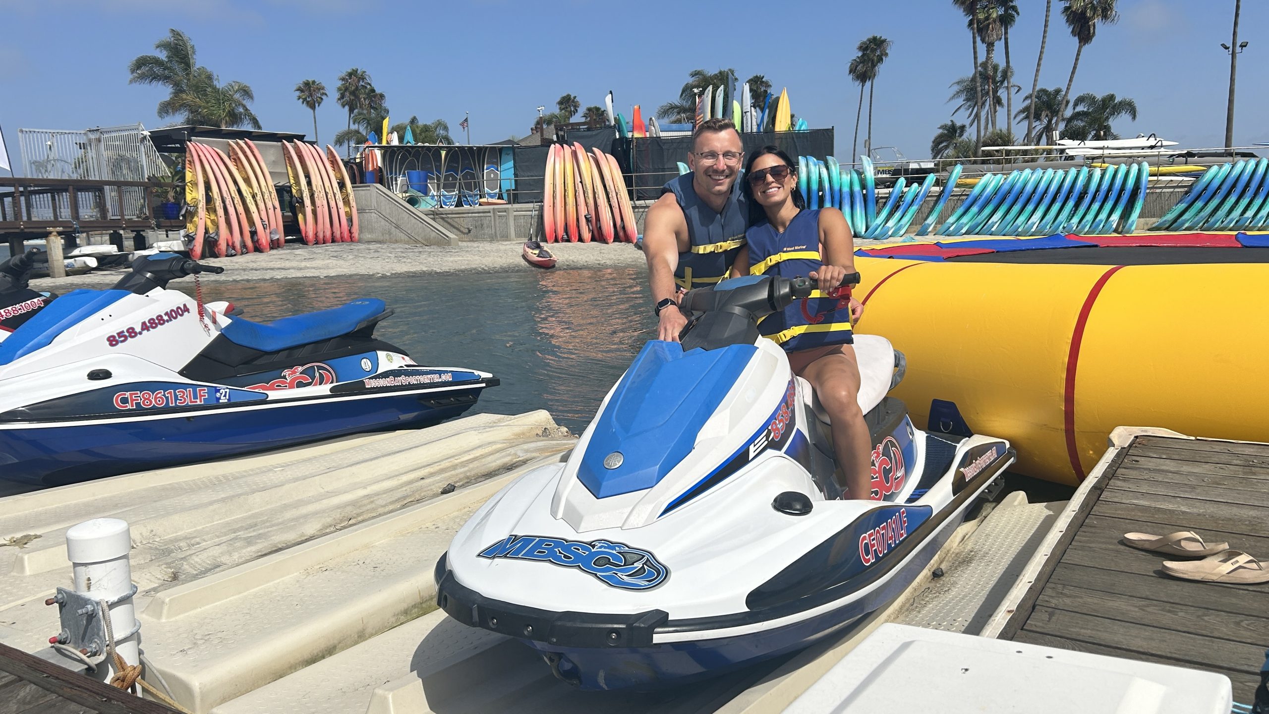 Jet ski renters preparing before a Mission Bay rental