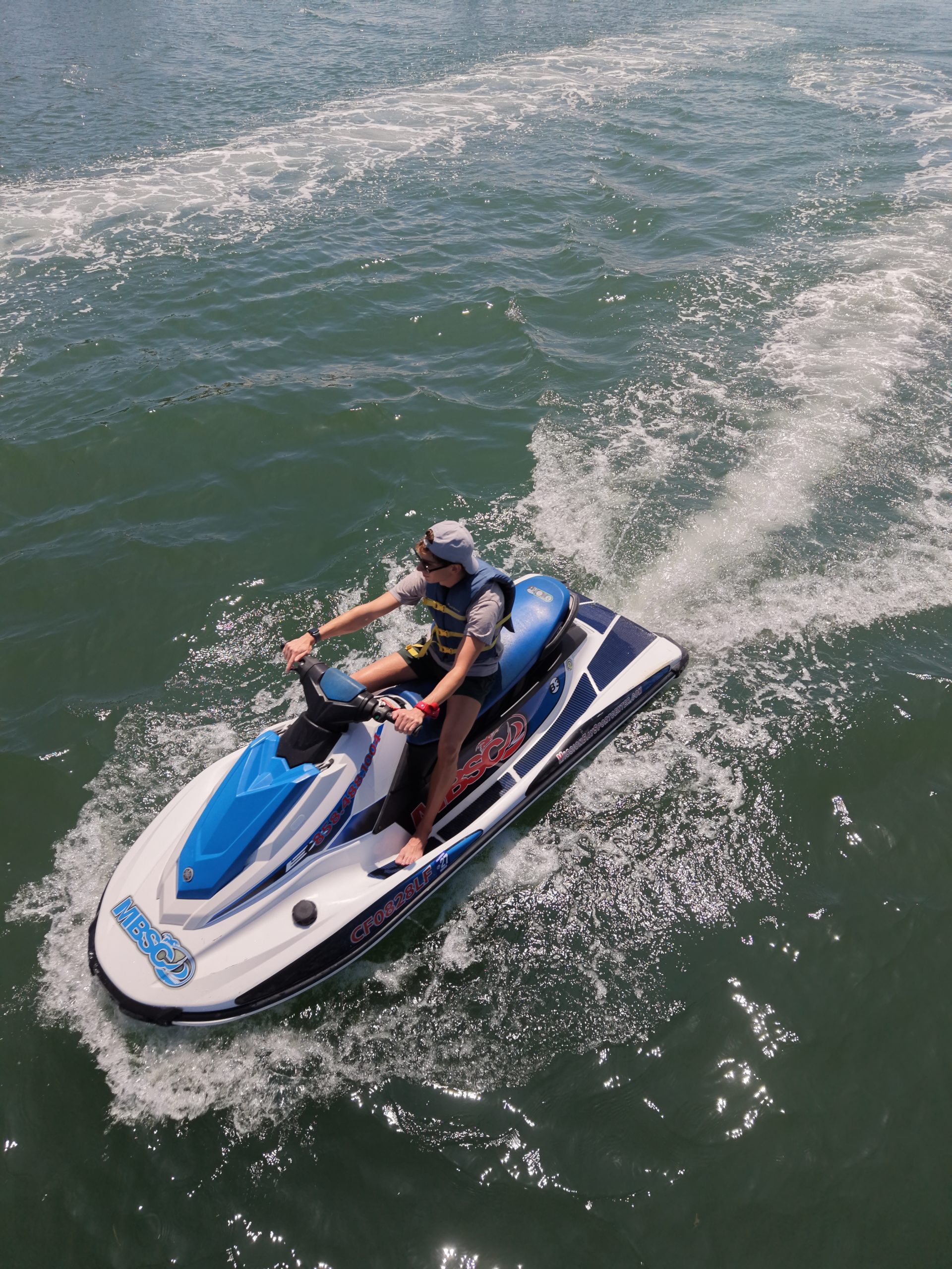 Jet ski on Mission Bay viewed from above for safe operating awareness