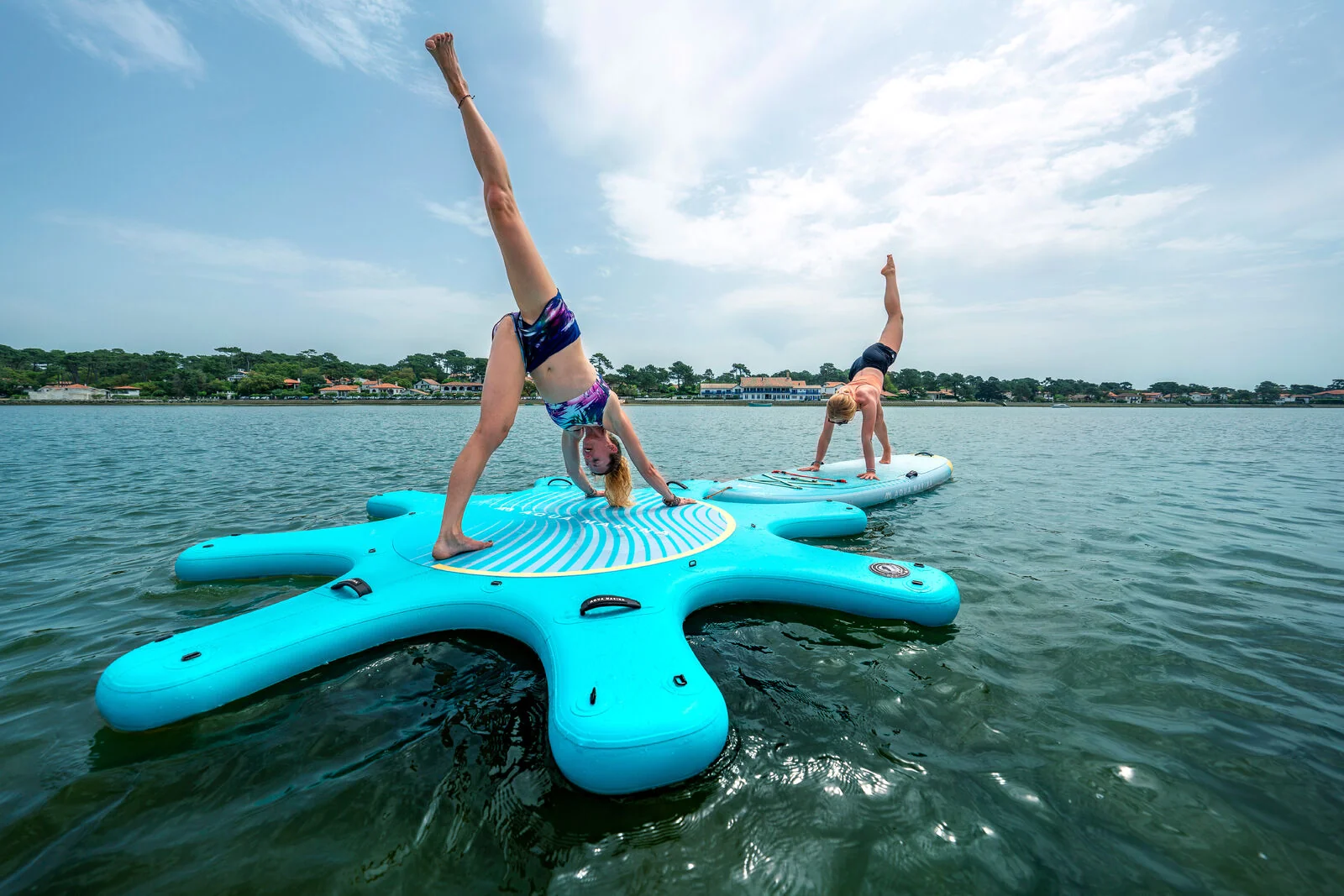 Yoga instructor leading a class on Mission Bay