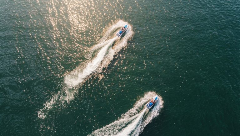 Jet ski wake sweeping across Mission Bay