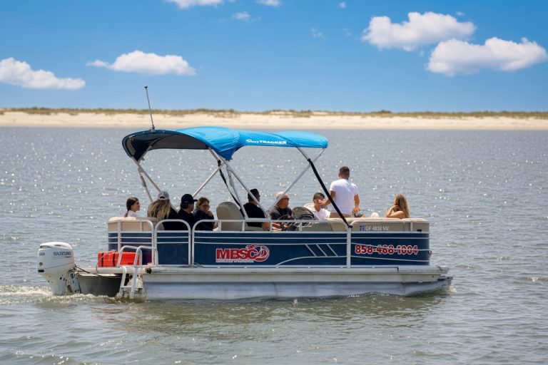 Pontoon boat carrying a group on Mission Bay